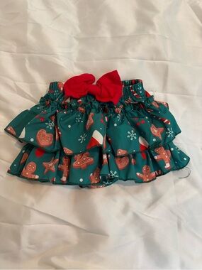 Girls Holiday Ruffled Skirt with Red Bow gingerbread theme